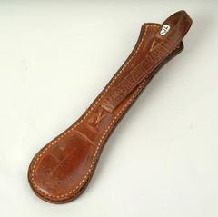 Leather strap of SAP BILLYJACK with leaded end and visible markings on front