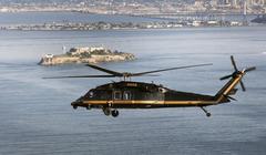 U.S. Customs and Border Protection Black Hawk helicopter flying near Alcatraz Island in San Francisco