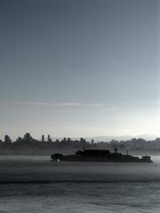 Alcatraz Island with historic prison buildings surrounded by water
