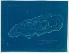 Historic aerial photograph of Alcatraz Island showing buildings, fortifications, and water supply system during new prison construction
