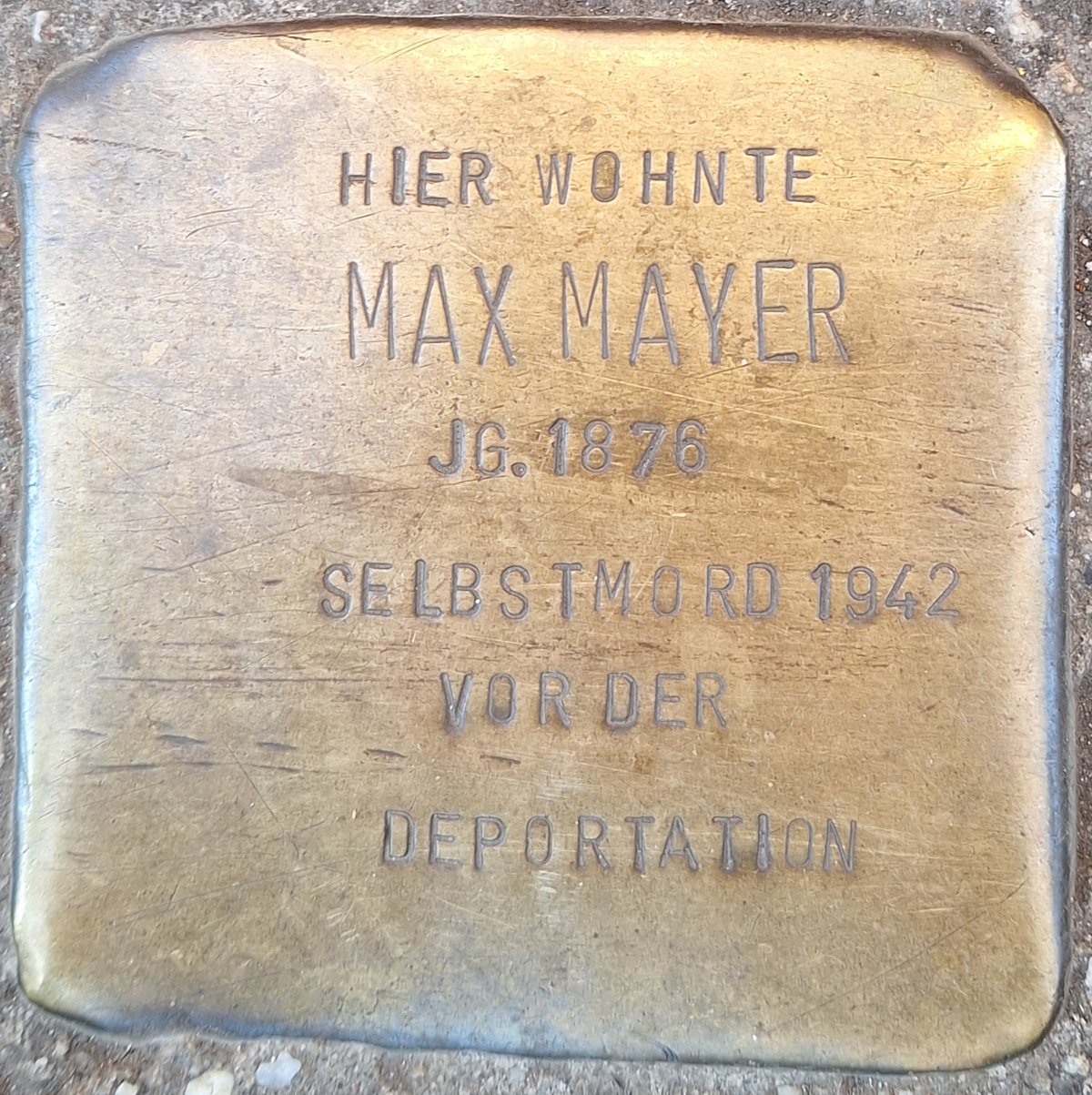 Stolperstein dedicated to Max Mayer embedded in the pavement at Tübinger Straße 70 in Stuttgart, Germany
