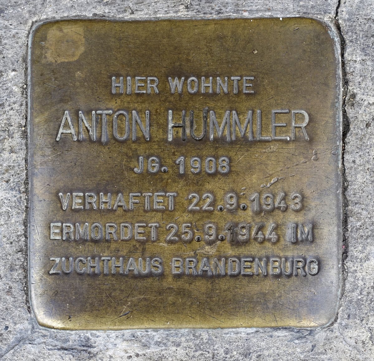 Stolperstein dedicated to Anton Hummler in Stuttgart, Germany embedded in pavement