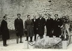 Group portrait of artists Sergio Perdomi, Tullio Garbari, Fortunato Depero, Alfredo Degasperi, Filippo Tommaso Marinetti, Franco Casavola, and Mino Somenzi in the Martyrs' Pit