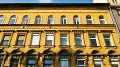 Buildings at Teleki László Square under blue sky