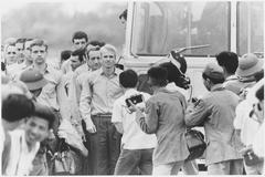 John McCain and fellow POWs lining up at Gia Lam Airfield after release in Hanoi