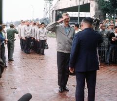 American POWs repatriated from Vietnam at Gia Lam airfield in Hanoi with USAF Capt. Robert Parsels