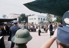 Ex-POW U.S. Air Force CPT John H. Nasmyth Jr. salutes COL Emil J. Wengel at Gia Lam Airport after release in 1969