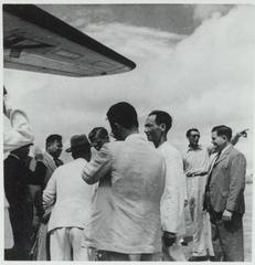 Arrival of Vietnamese government ministers at Hanoi aerodrome in 1949, greeting officials