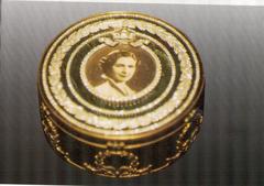 Box of agate framed by gold with cover image of Queen Farida