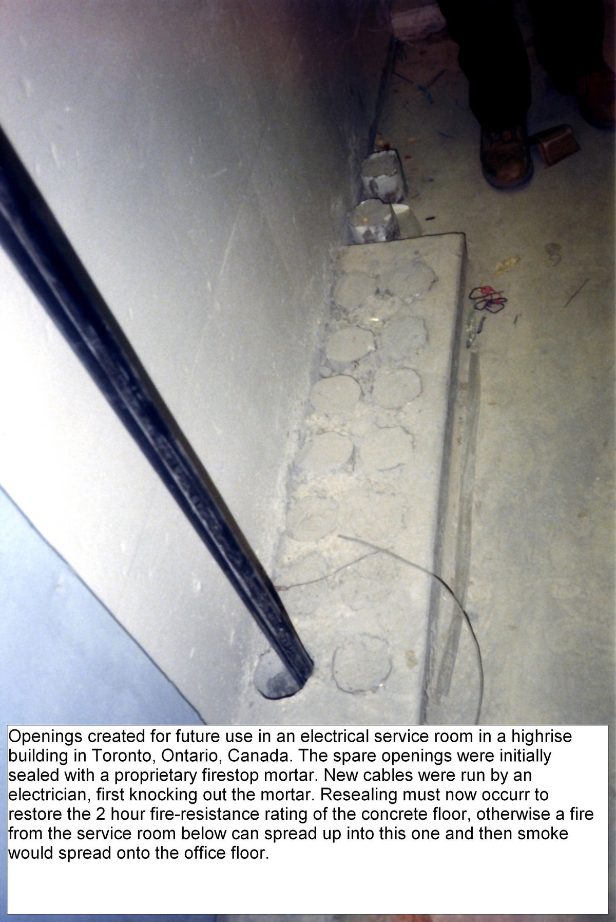 Re-entered openings in a building floor with improperly sealed firestops