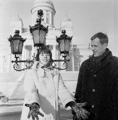 Swedish actor Harriet Andersson and Finnish film director Jörn Donner at Helsinki Senate Square in 1965