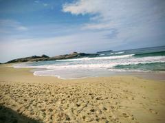 Praia Mole beach with waves and people in Florianopolis Brazil