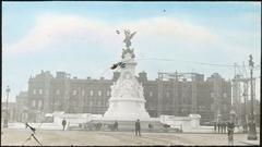 Victoria Memorial with Buckingham Palace under scaffold in the background
