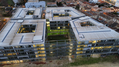 Aerial view of IAE Bordeaux campus with buildings and green areas