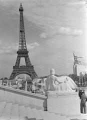 Eiffel Tower and Soviet Union pavilion viewed from the Palais de Chaillot stairs during the 1937 Paris World Exhibition