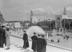 View from Palais de Chaillot terraces over water fountains with Eiffel Tower and international pavilions at 1937 Paris World Exposition