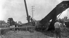 Vintage black and white photograph of pilot Charles Rector standing in front of an aircraft