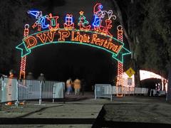 Entrance to the Festival of Lights with decorative illuminated arches at Griffith Park, Los Angeles