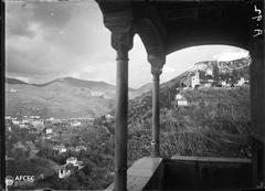 Panoramic view of Alhambra palace and Generalife gardens from the Mirador de la Reina in Granada, Spain
