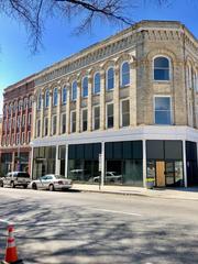 Bass Furniture Building in Atlanta, Georgia with classic architectural design and blue sky background