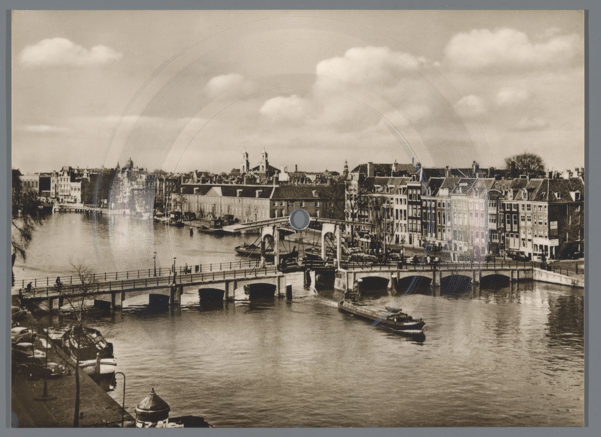 Vintage postcard featuring Amsterdam's Magere Brug over the Amstel river with grooves of a gramophone record for 45 RPM play of 'Calypso Pampas' by Rud. Paché