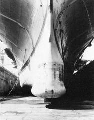 Bow of USS Intrepid (CVS-11) with AN/SQS-23 sonar at New York Naval Shipyard in 1965