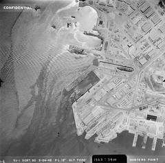 Aerial photograph of San Francisco Naval Shipyard at Hunters' Point showing USS Intrepid, USS Cabot, USS Pennsylvania, and USS Drum on 24 May 1945
