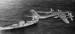 Soviet Tupolev Tu-95 Bear flying over USS Intrepid aircraft carrier in 1971