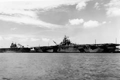 USS Enterprise CV-6 and USS Intrepid CV-11 aircraft carriers in port in July 1944