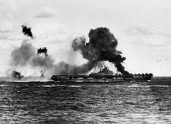 USS Intrepid (CV-11) aircraft carrier burning after kamikaze attacks, April 1945