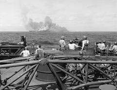 USS Intrepid aircraft carrier burning after kamikaze attacks off the Philippines in 1944