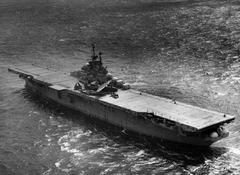 USS Intrepid aircraft carrier underway in 1947 with Martin PBM Mariner flying boats, Vought F4U Corsair, North American SNJ Texan on deck