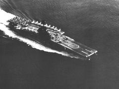Aerial view of the U.S. Navy aircraft carrier USS Intrepid (CVS-11) underway in 1966