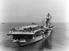 Aft view of the U.S. Navy aircraft carrier USS Intrepid (CVS-11) during overhaul at Norfolk Naval Shipyard, 1962-1963, with three Sikorsky SH-3A Sea King helicopters parked aft