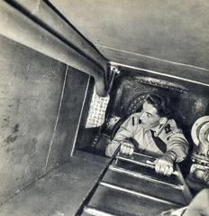 Commander Houot descending into the FNRS 3 sphere underwater submersible