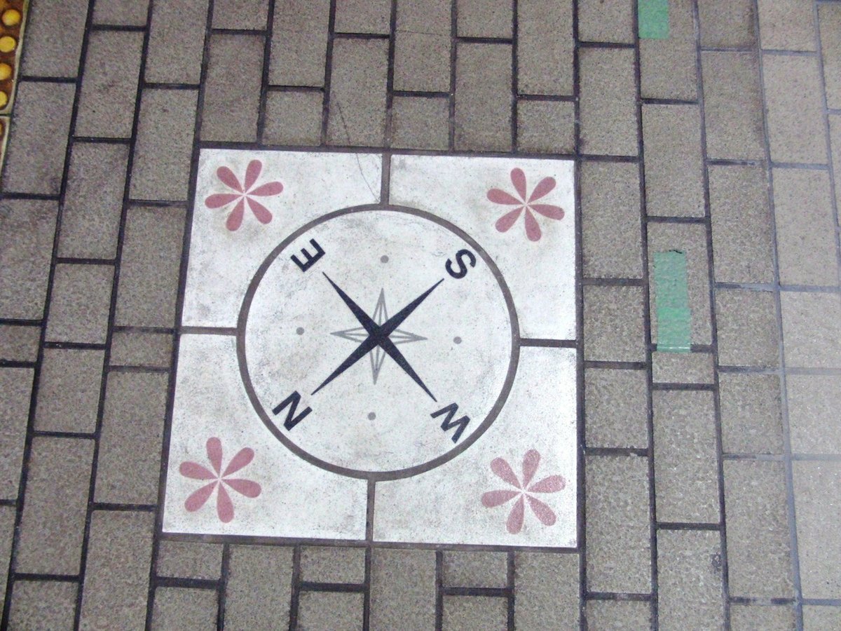 Direction board at Tsurumi-Ryokuchi Station platform in Japan
