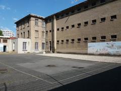 Exterior facade of the main building of Montluc Prison from the courtyard with the location of the Jewish barracks