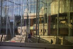 Melbourne Museum modern architecture exterior view with large glass panels and white structures