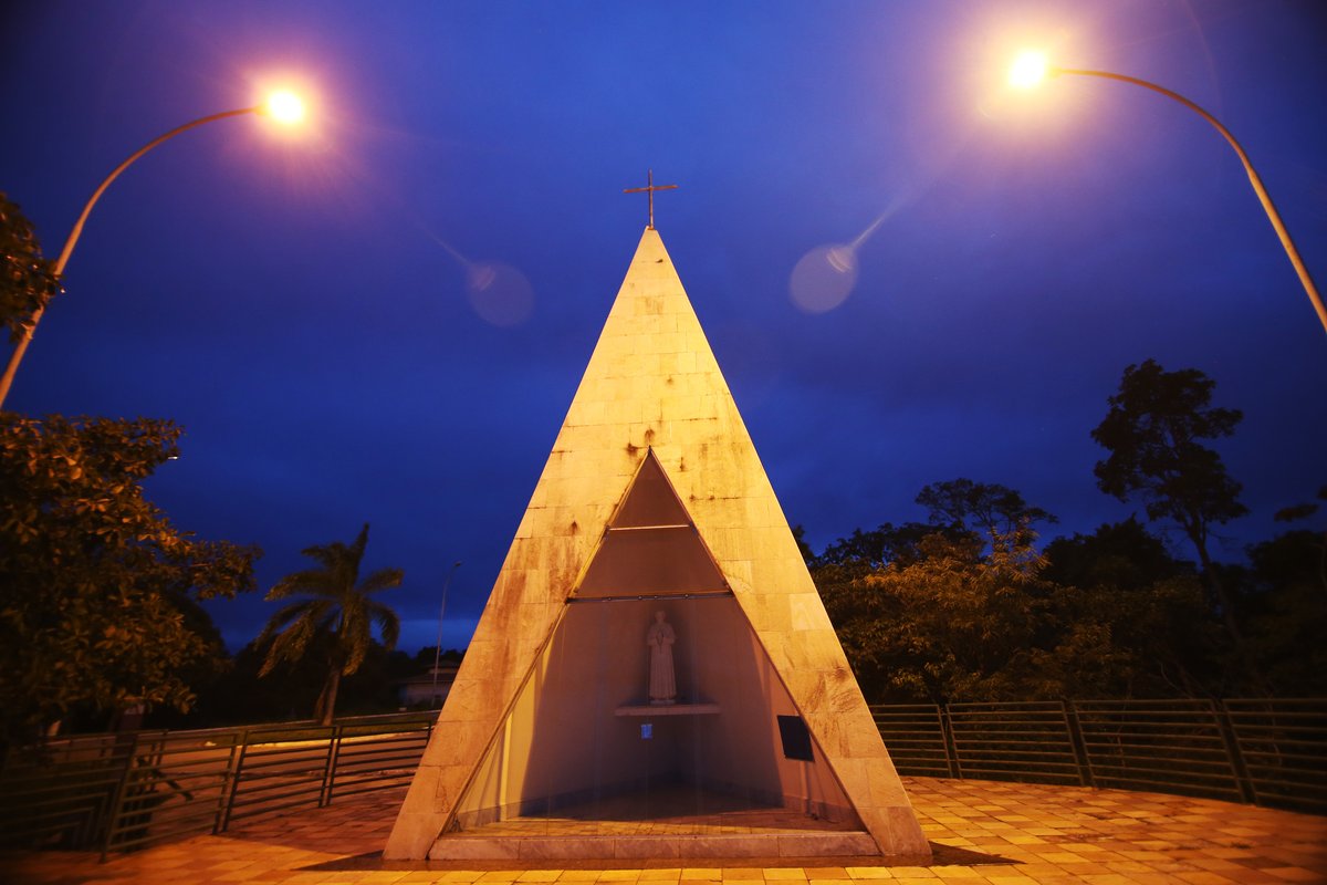 Ornate Dom Bosco Chapel in Brasilia with intricate stained glass windows and white roof structure
