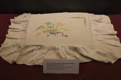 Embroidered pillow made by female prisoner at Hoa Lo Prison Hanoi Hilton