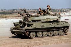 Marines driving a Soviet bloc ZSU-23-4 armored vehicle during Exercise Kernel Blitz 97 at Camp Pendleton