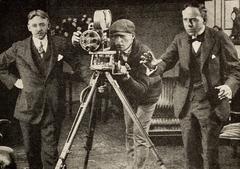 Arthur Berthelet directing a scene at Essanay Studios with cinematographer Harry Zeck observing and Marvin Spoor operating the camera, Chicago 1917