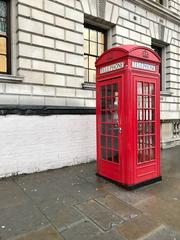 Red British telephone box on Parliament Square in London