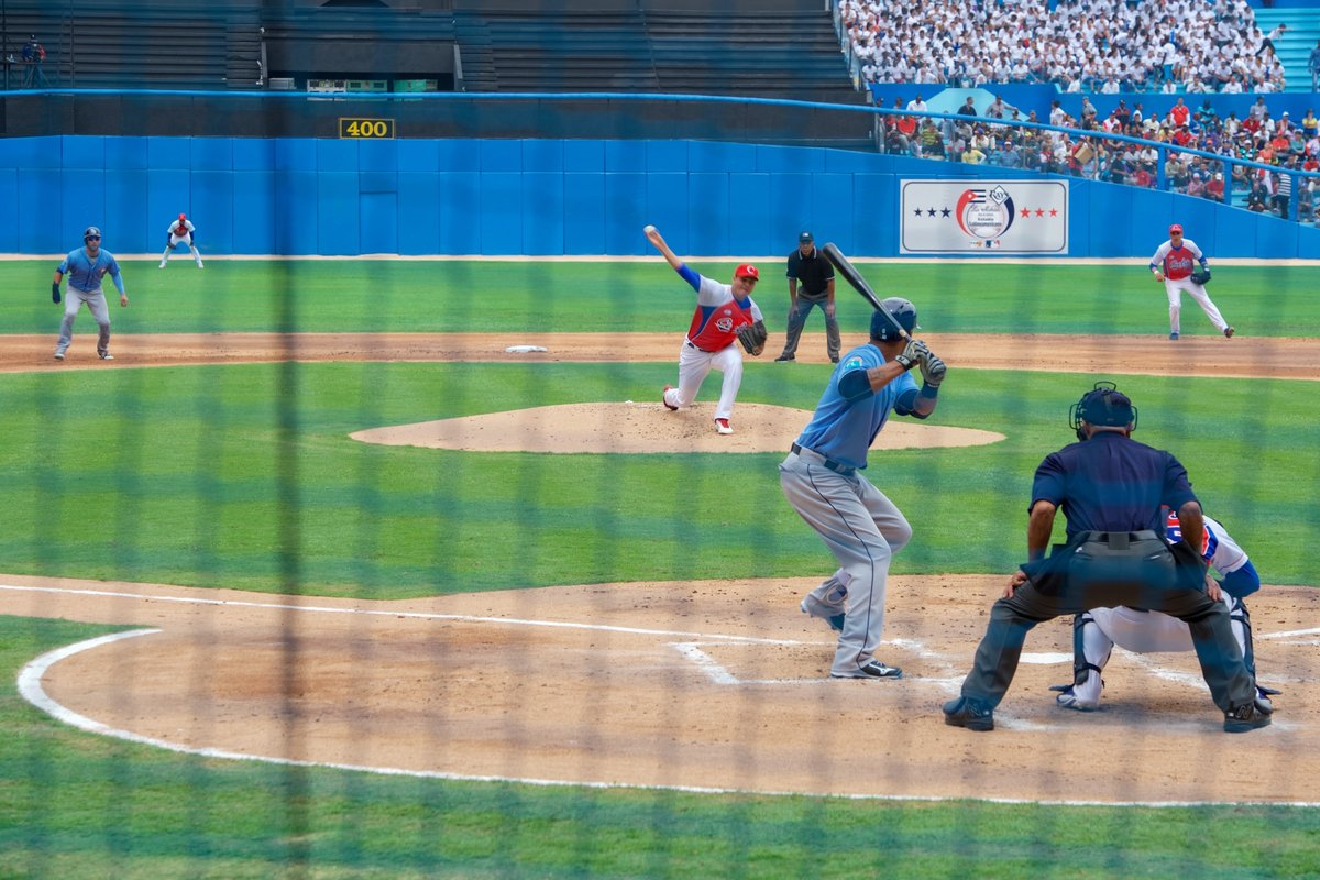 Cuban National Baseball Team pitcher throws pitch during exhibition game against Tampa Bay Rays in Havana stadium