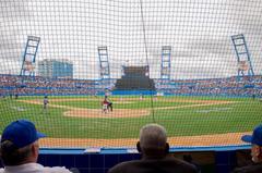 Cuban National Baseball Team pitcher throwing pitch during exhibition game in Havana