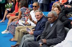 U.S. President Barack Obama sitting with Cuban President Raul Castro at Estadio Latinoamericano in Havana during a baseball exhibition game
