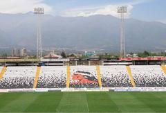 Aerial view of Estadio Monumental surrounded by urban landscape