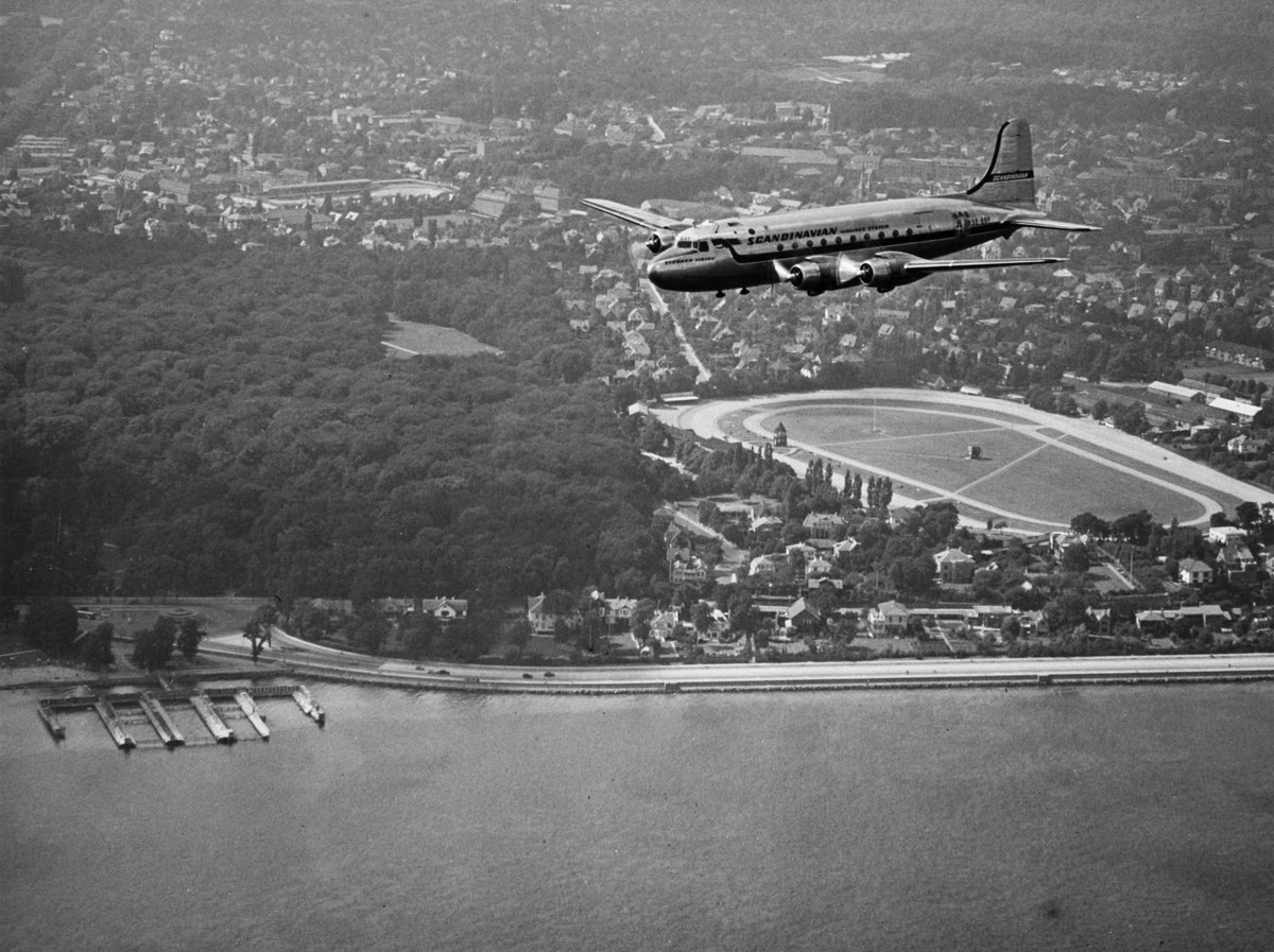 SAS DC-4 Sverker Viking SE-BBF flying in the 1950s sky