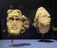 Sculpted heads of Mithra and a dadu bearer discovered in the Mithraeum of Angers