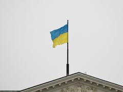 Flag of Ukraine displayed at the Warsaw City Hall in solidarity with attacked Ukraine